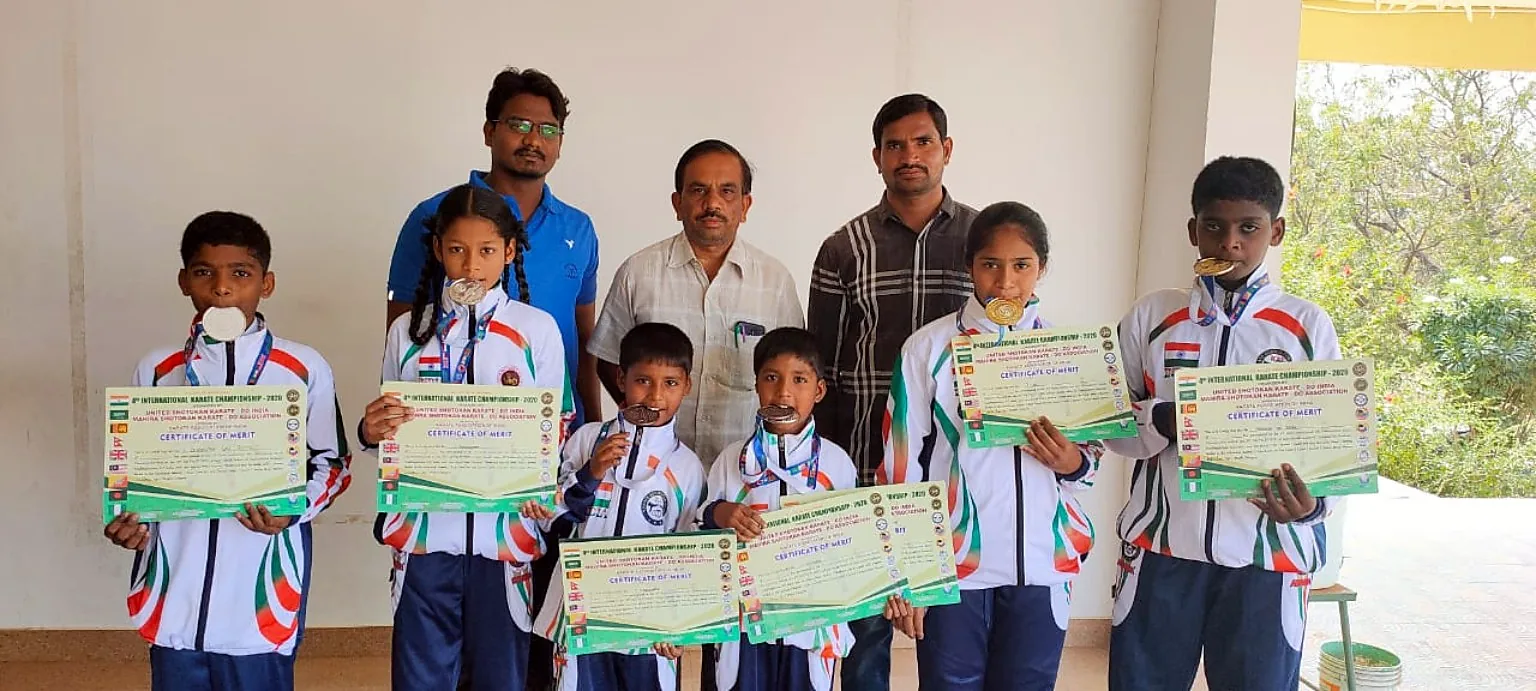 Blue Moon students with international karate medals and certificates