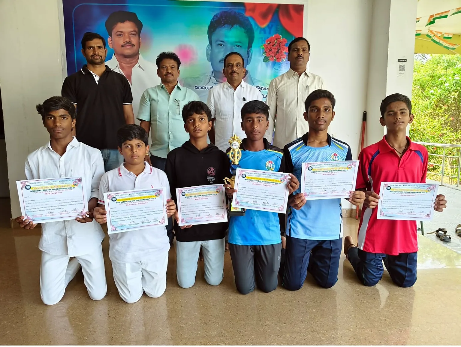 Blue Moon Goal Shoot Ball team with certificates and trophy
