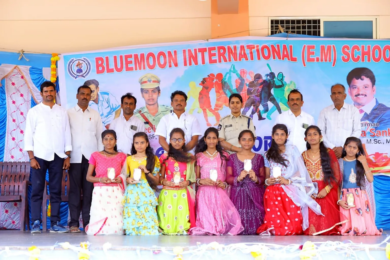 Blue Moon girls receiving sports day awards